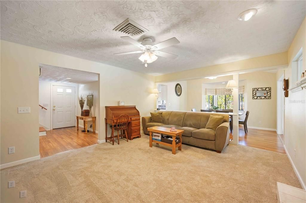 The Living Room backs up to the Dining Room making it convenient when entertaining