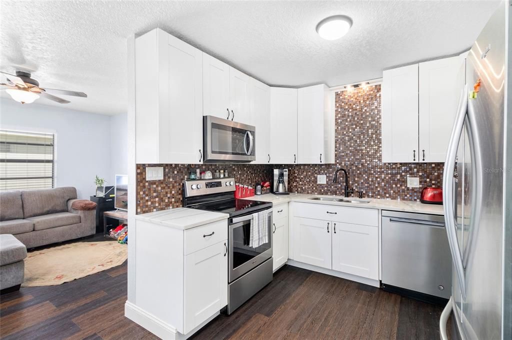 Kitchen leads into family room