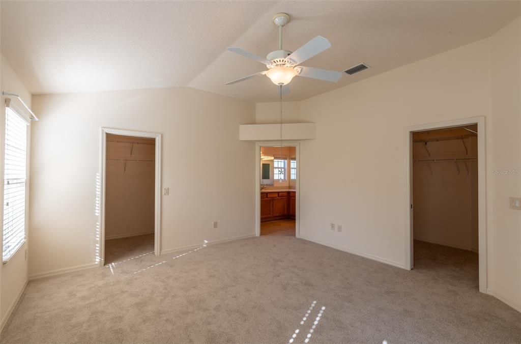 Primary Bedroom with His and Her Closet