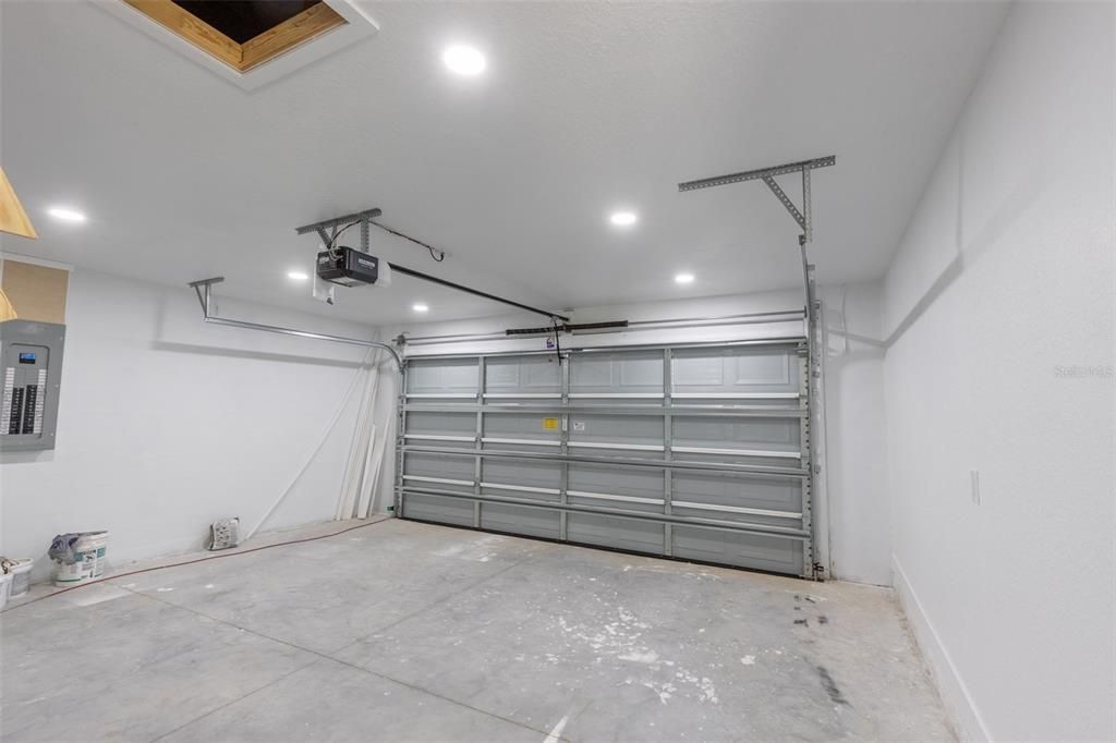 Double car garage spacious for your vehicles and tools/storage.