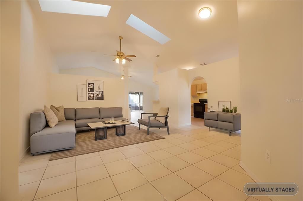 Front living area from front door. Those soaring ceilings are gorgeous.