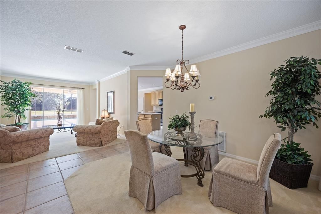 Combined Living and Dining room opens to large pool area