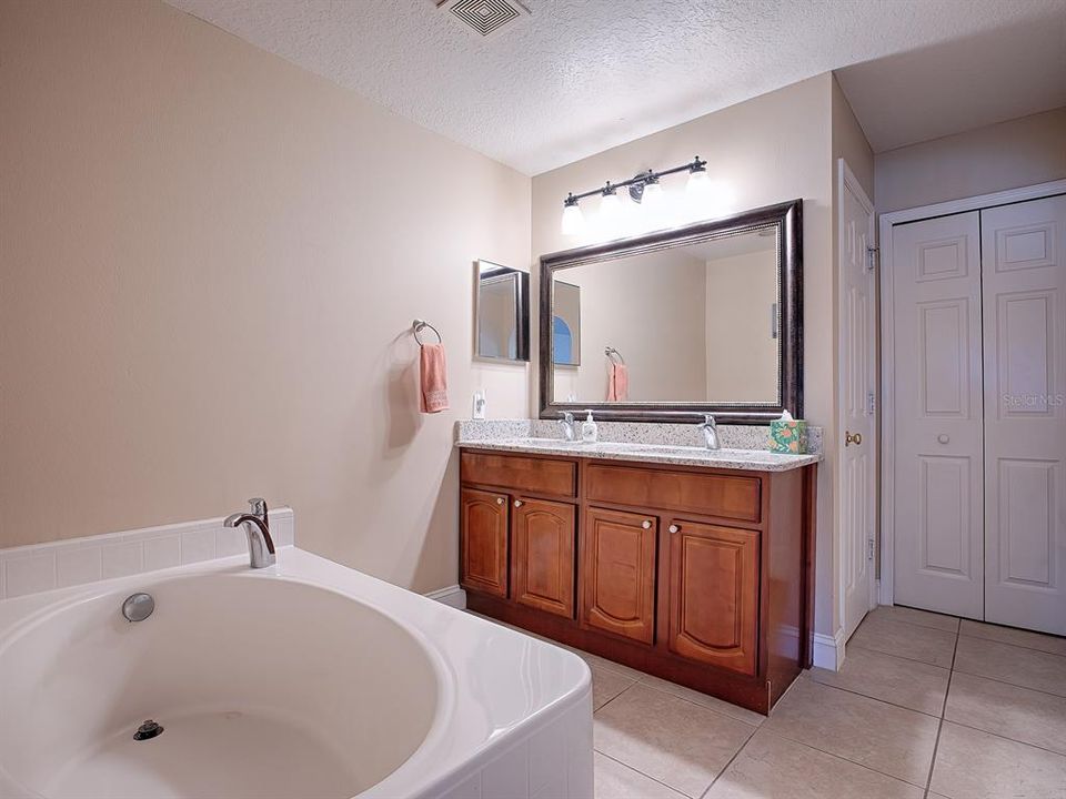 Primary ensuite dual sinks, granite countertops