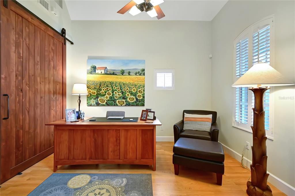 Front room (separated by barn door) can be a second living room or home office.