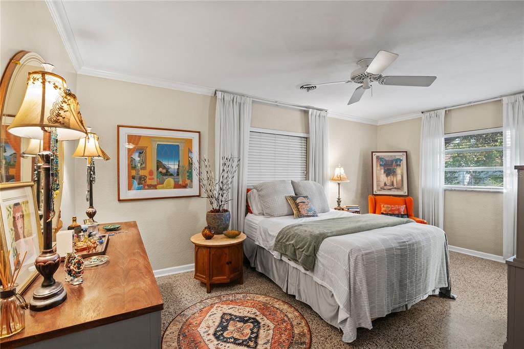 Primary bedroom with walk-in closet and en suite bathroom