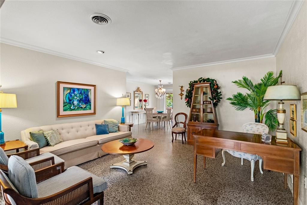 Living room with views into the dining room