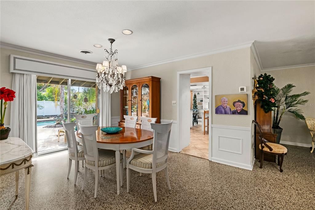 Dining room with views into the kitchen and family room