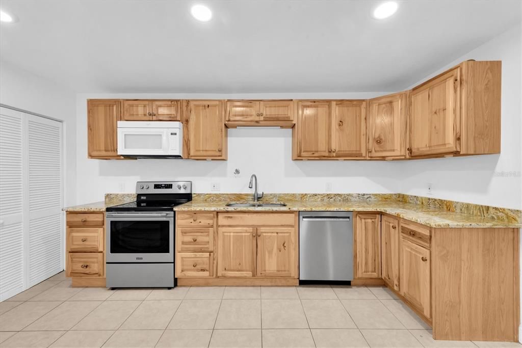 Recently update kitchen with granite counter tops and large pantry with plenty of storage.