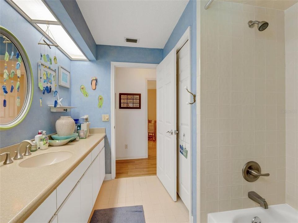 And boasts an extra-long vanity and large linen closet.