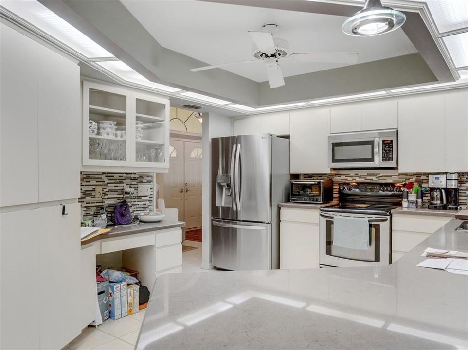 A built-in writing desk, soffit task lighting . . .