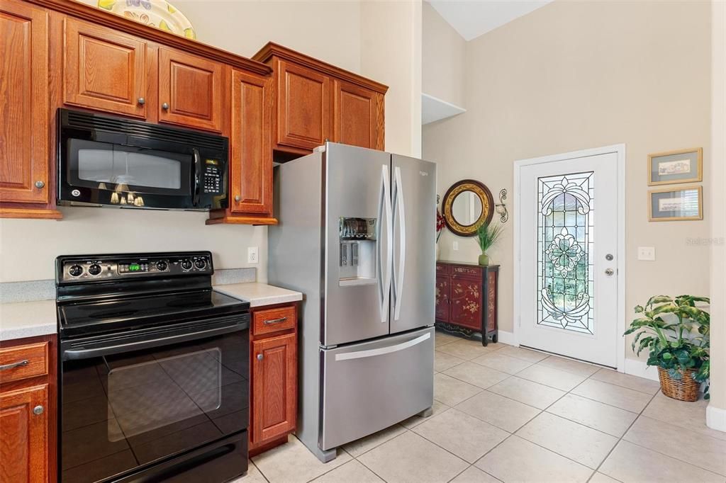 Interior front entry into home overlooking Kitchen