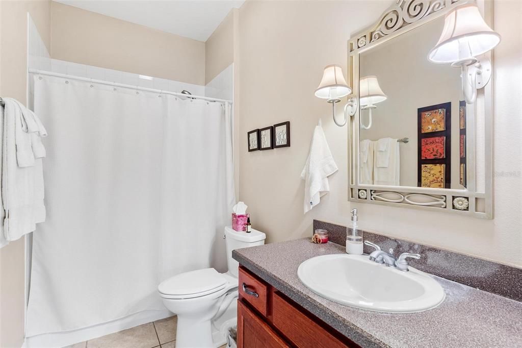 Guest bath features shower/tub combo