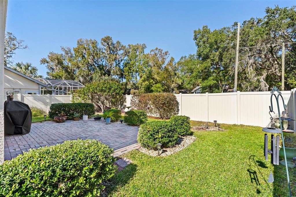 Backyard includes brick paver patio