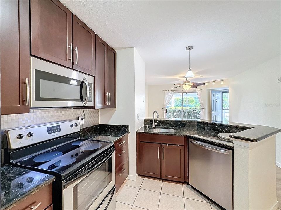 GREAT LAYOUT IN KITCHEN OPEN TO LIVING ROOM