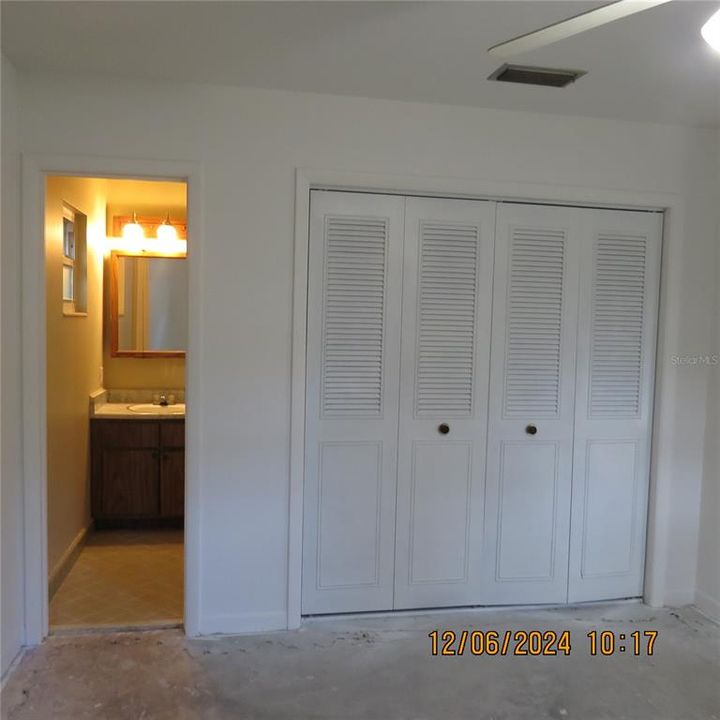 Primary bedroom and bathroom