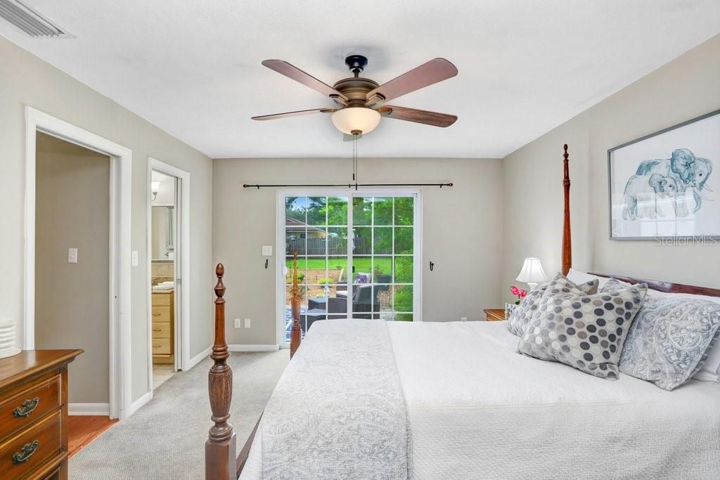 Master Bedroom with Doors going out to Courtyard area.