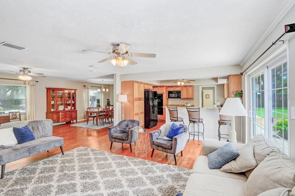 In great room looking toward kitchen and dining area.