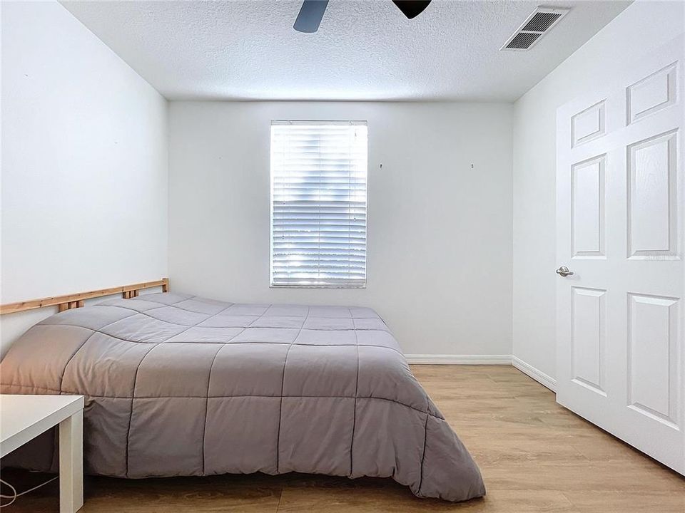 2nd Bedroom measures 10.6' x 10.2' with large closet and lots of natural light.