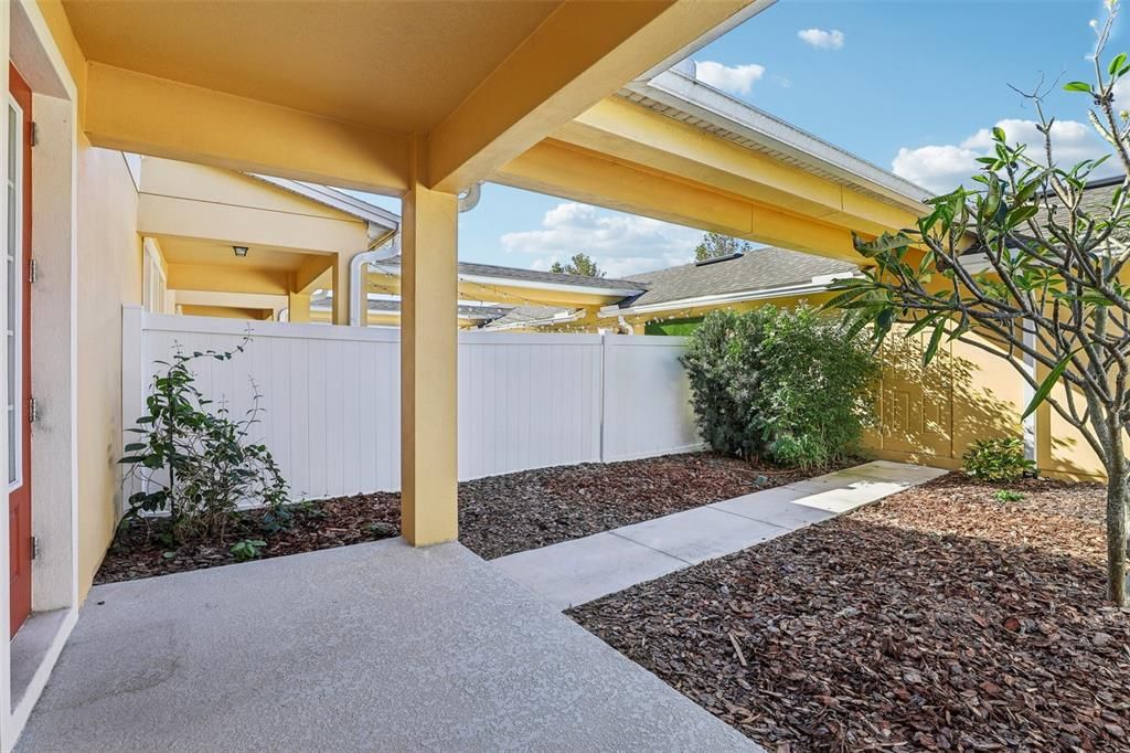 Private Patio and Backyard Space between the Main House and Attached Garage