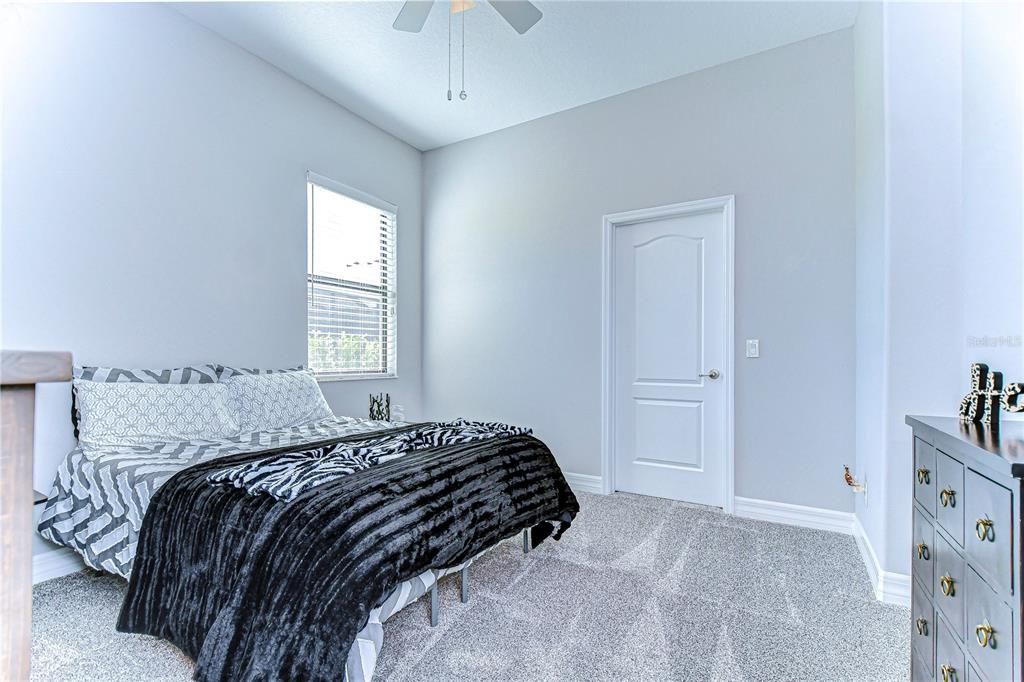 Laundry room with built in soft-close cabinets and sink.