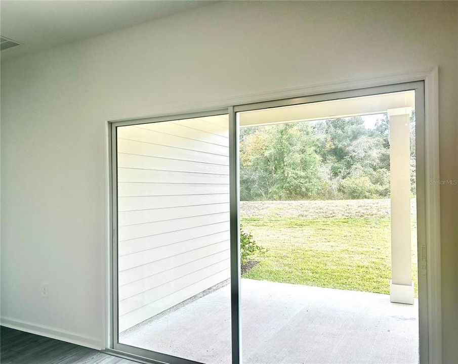 Back Sliding Glass Doorway to Covered Lanai