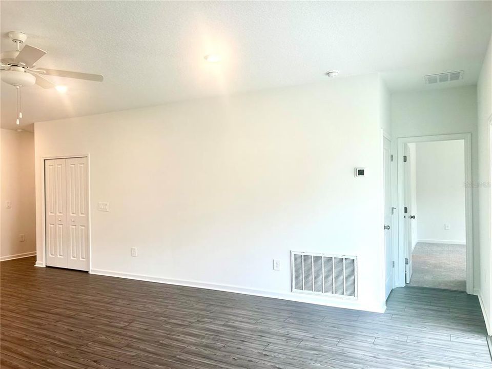 Family Room/Entrance to Primary Bedroom Back of Home