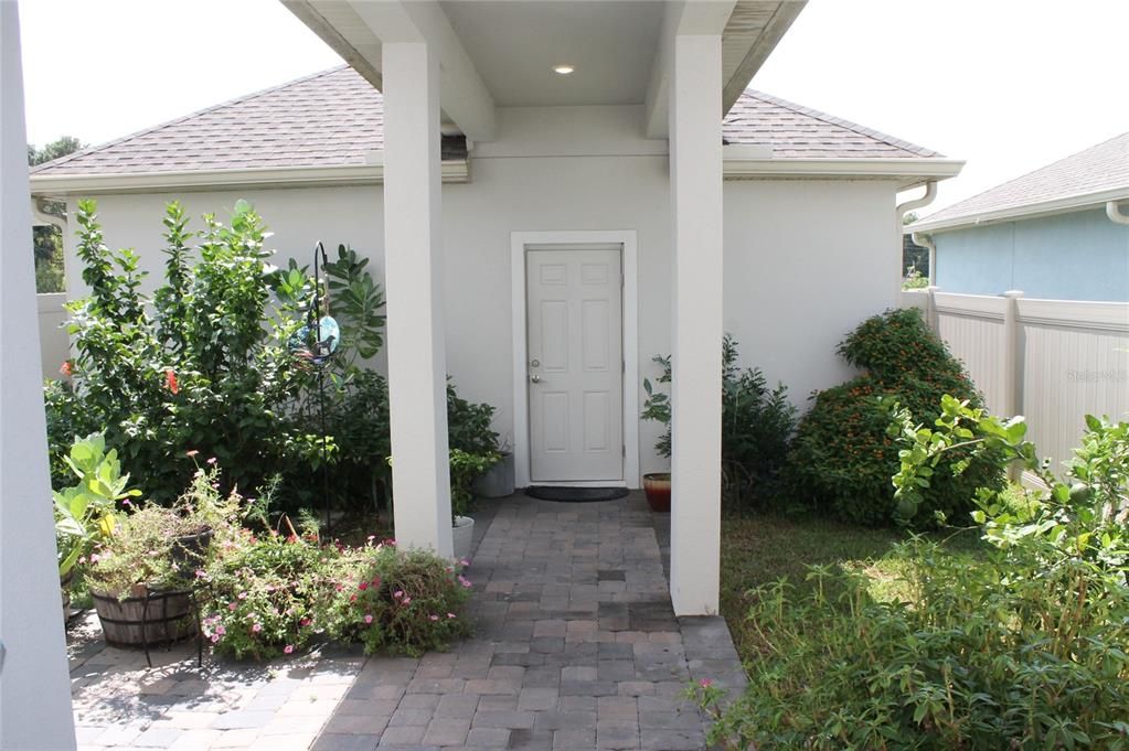 Covered patio to detached 2 car garage