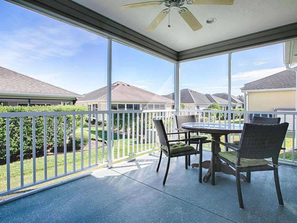 PAINTED CONCRETE FLOORING ON LOVELY LANAI. PRIVACY LANDSCAPING.