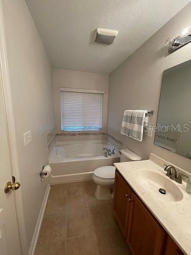 PRIMARY BATH WITH TWO SINKS AND GARDEN TUB