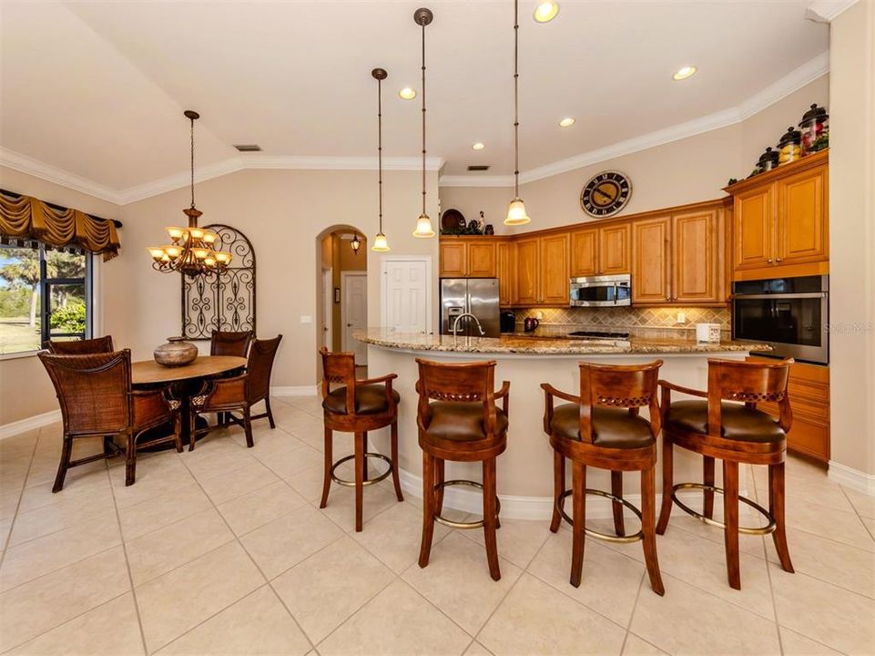 New GE Profile appliances enhance both the functionality and aesthetics of this well-designed kitchen.