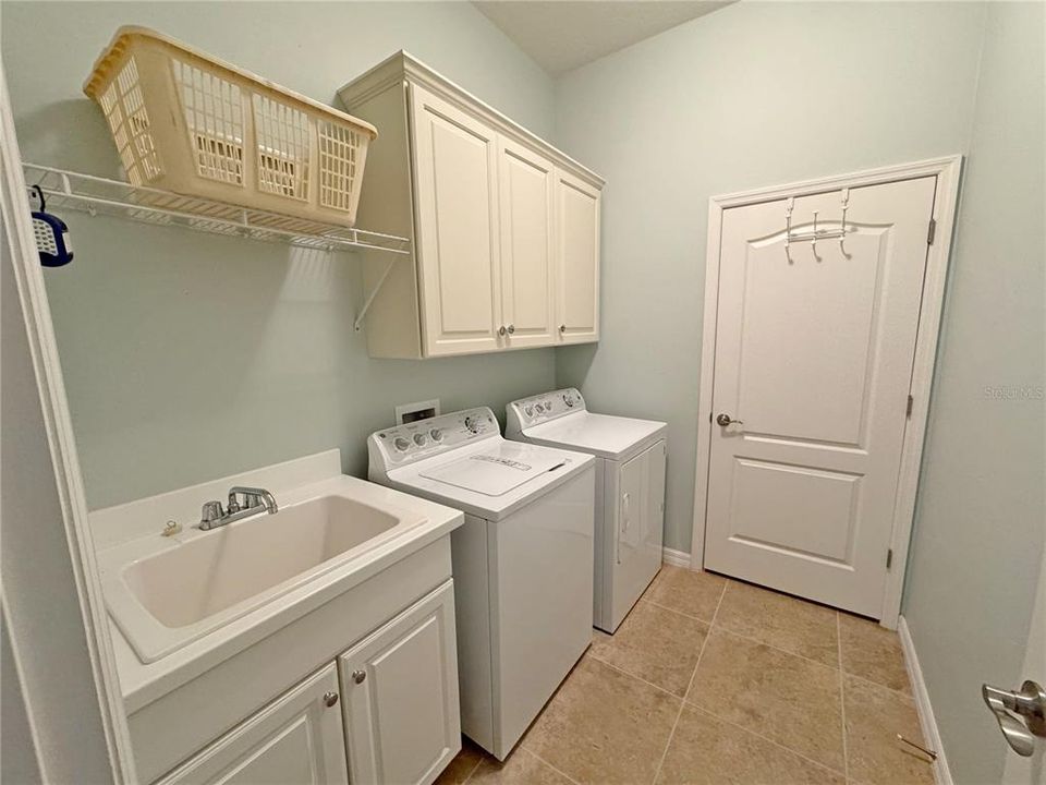 Inside Utility room with slop sink