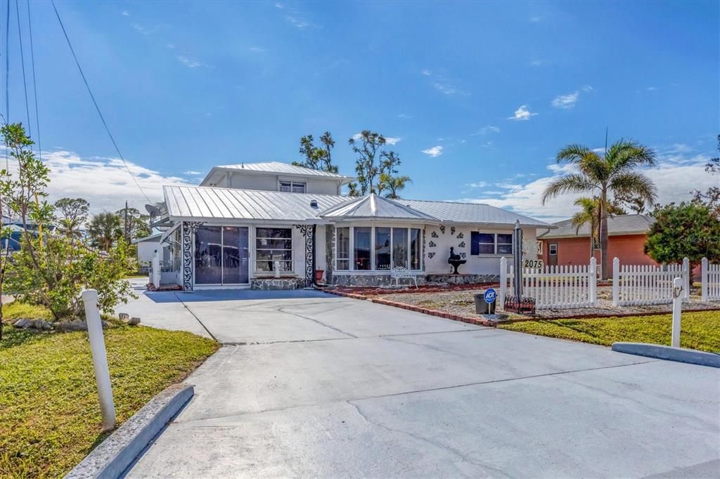 Front entrance and extra wide driveway