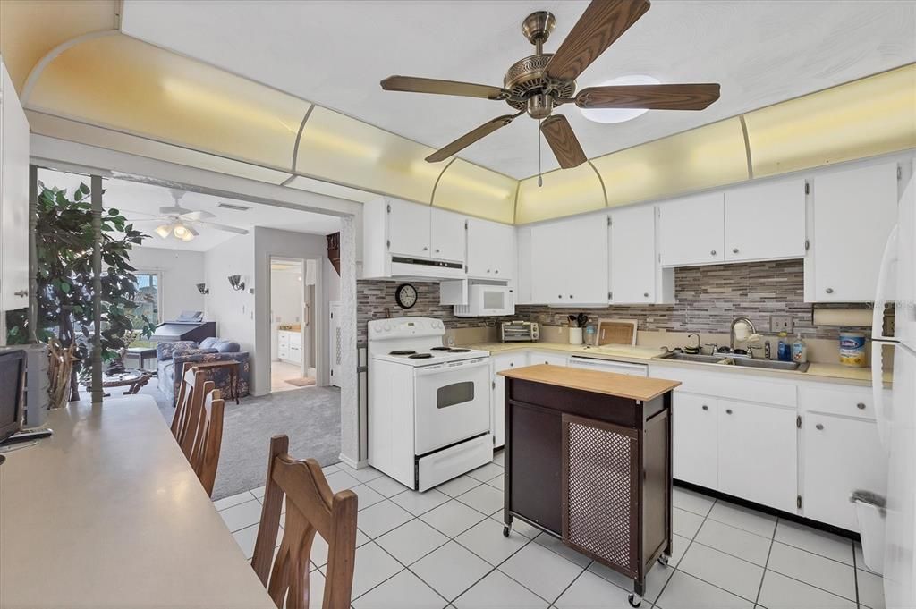 Kitchen with additional eating space along the wall