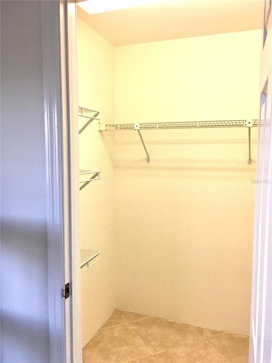 Walk-In Closet in Primary Bedroom