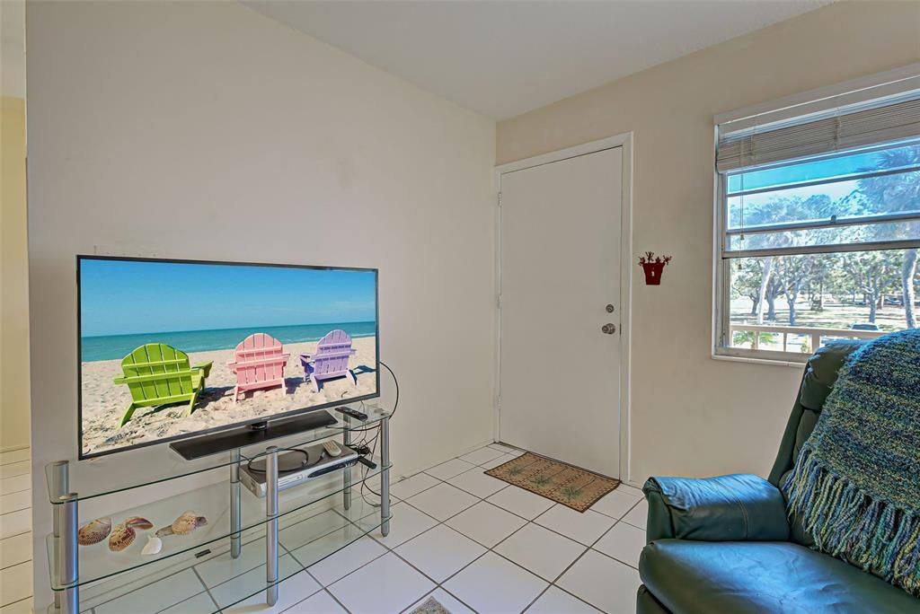 Walk in to the light and bright living room of this condo.