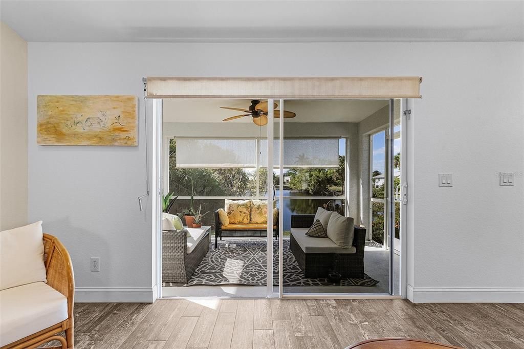 Entryway featuring hardwood / wood-style floors, ceiling fan, and a wealth of natural light