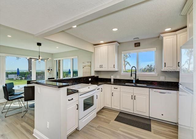 Kitchen Open to dining and living rooms