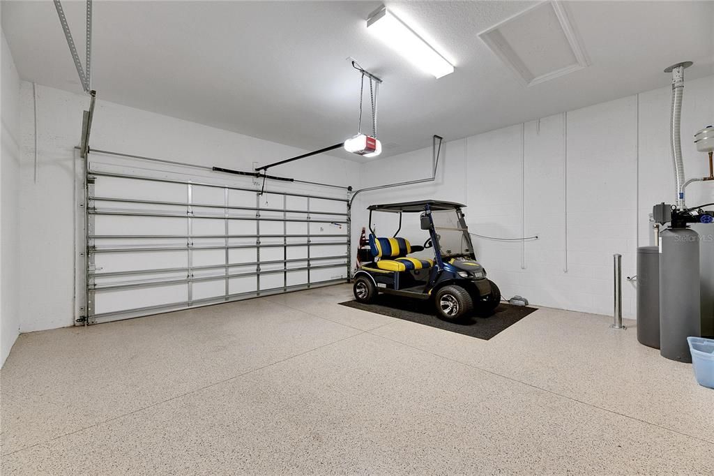 Garage Features Reinforced Door with Extra Insulation for Quiet Door Opening.  Quality Epoxy Flooring