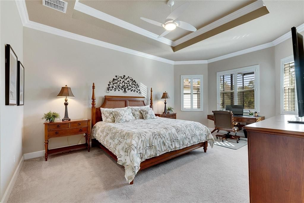 Primary Suite Features a Bay Window, Two Walk-In Closets and Large Bathroom with Walk-In Shower