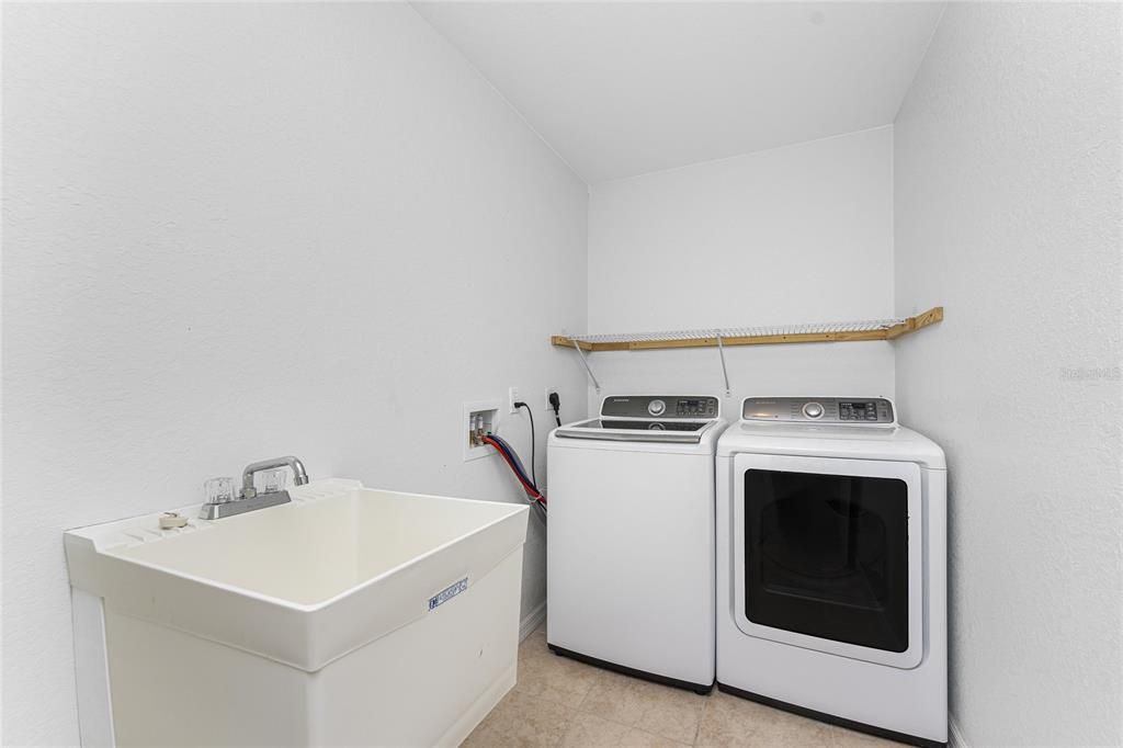 Inside laundry room with sink