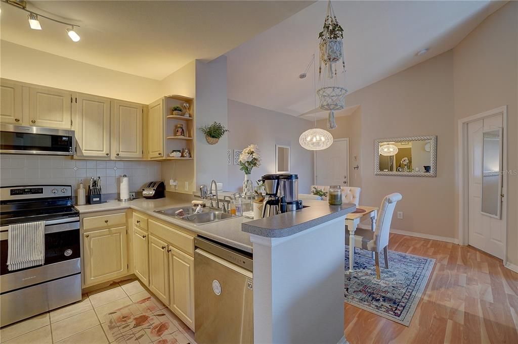 View of kitchen and dining room from living room