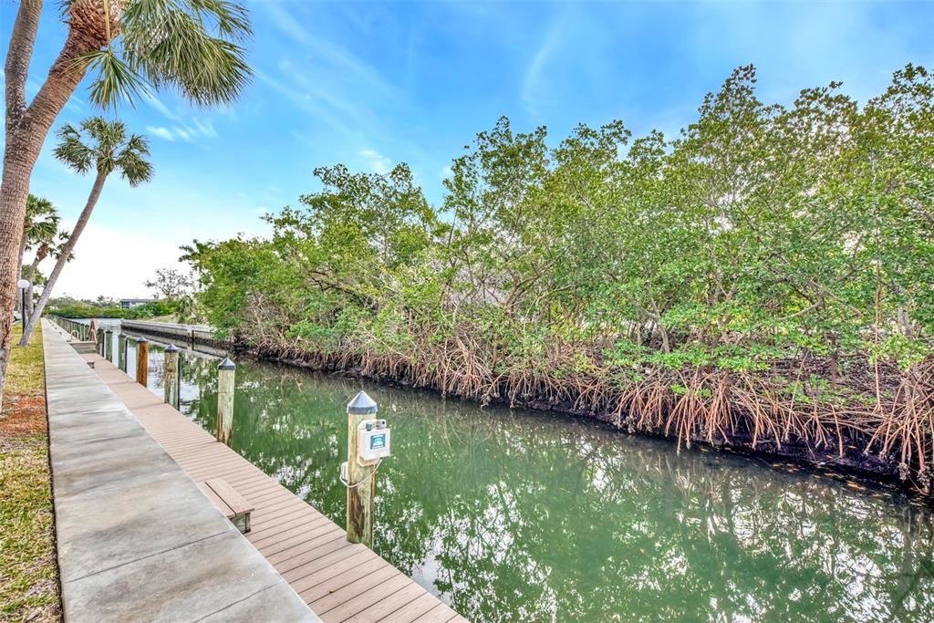 CANAL ALONGSIDE CONDO BUILDING WITH DOCKAGE FOR RESIDENTS