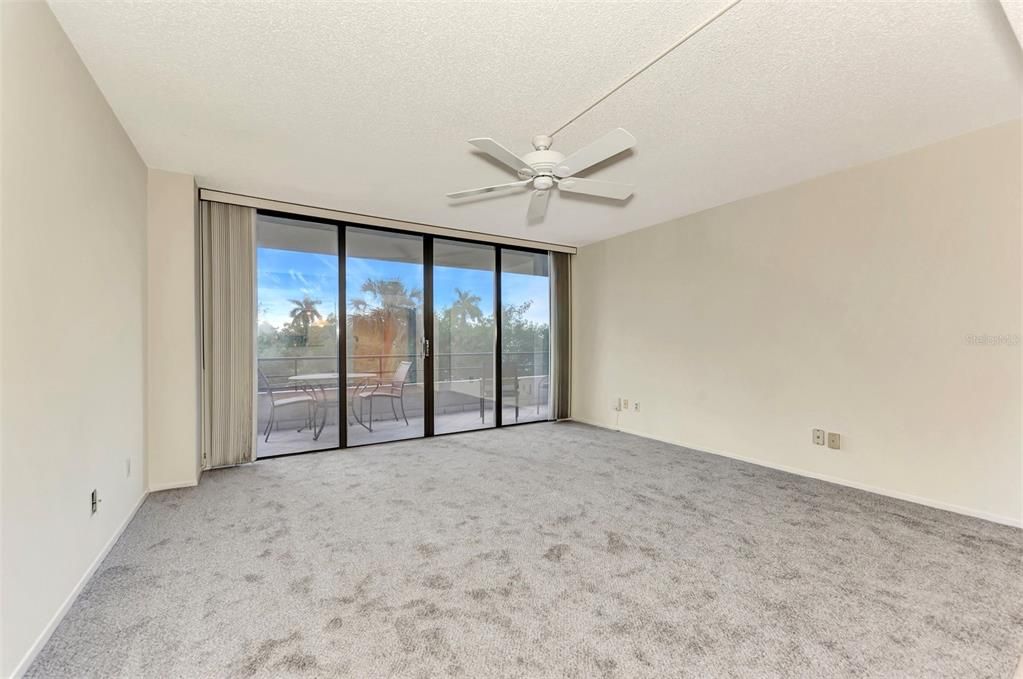 LIVING ROOM LOOKING TOWARDS BALCONY/PATIO