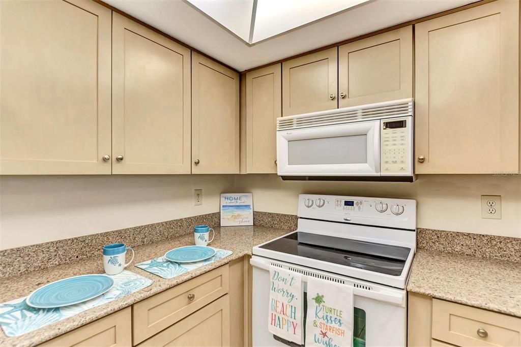 KITCHEN W/SOLID SURFACE COUNTERS