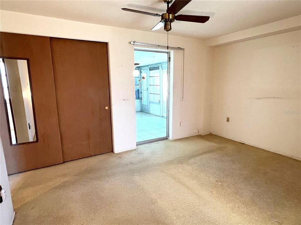 Primary bedroom with access to the Florida room