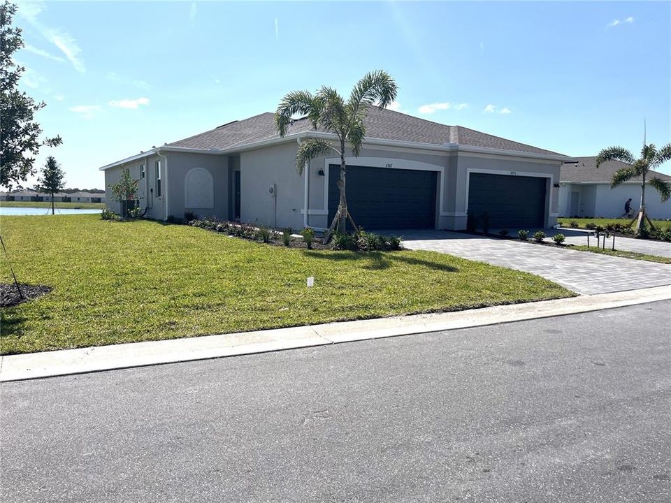 large side yard - unit is on left of the duplex