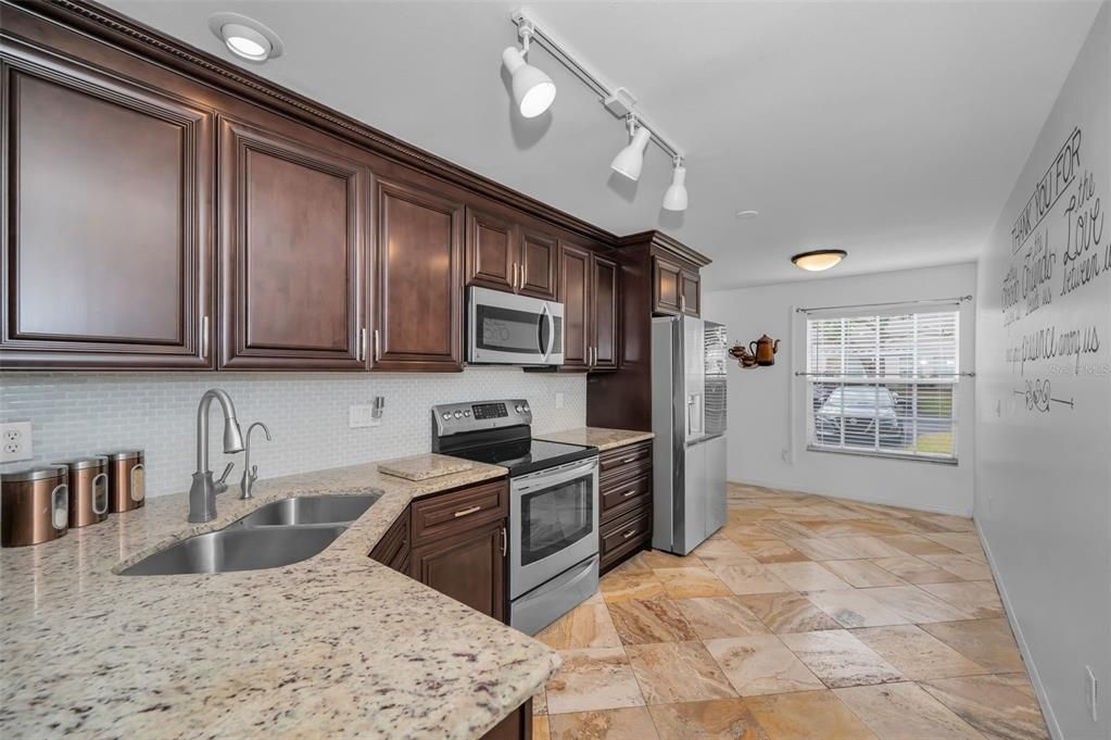 Chef's kitchen with granite counters