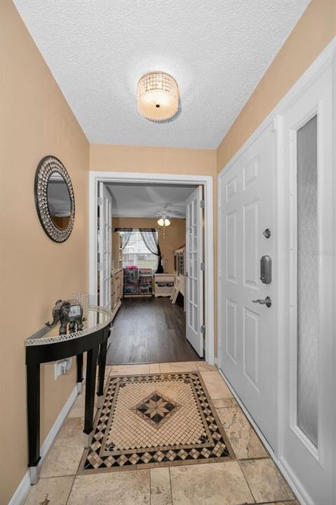 Foyer with doors open to bedroom 3