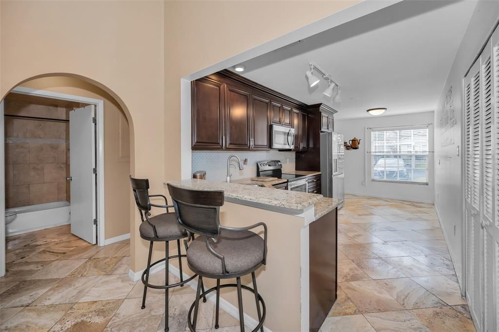 Breakfast bar with granite counter