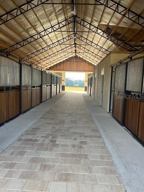 Center aisle with gorgeous European stallfronts and pavers